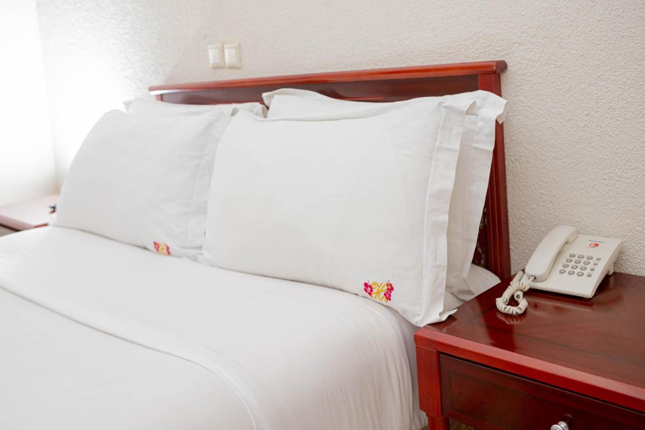 Hotel Hibiscus Louis Libreville Exterior photo